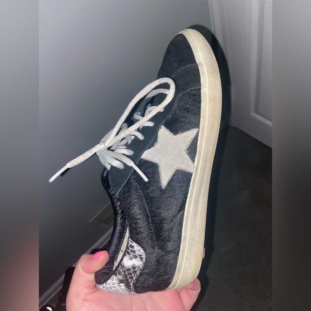 Black and white snakeskin sneakers